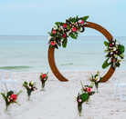 wood circle moon gate wedding arch arbor beach wedding rental in panama city beach tropical wedding flowers florist