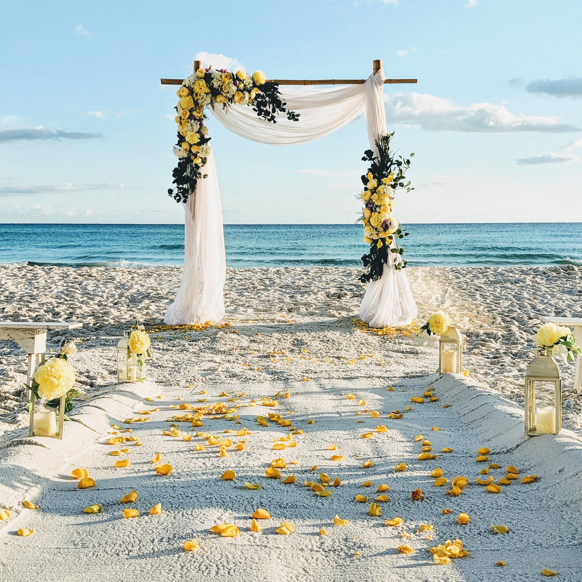 bamboo beach destination elopement wedding decor rental panama city beach yellow wedding florida wedding panama city beach wedding event rentals