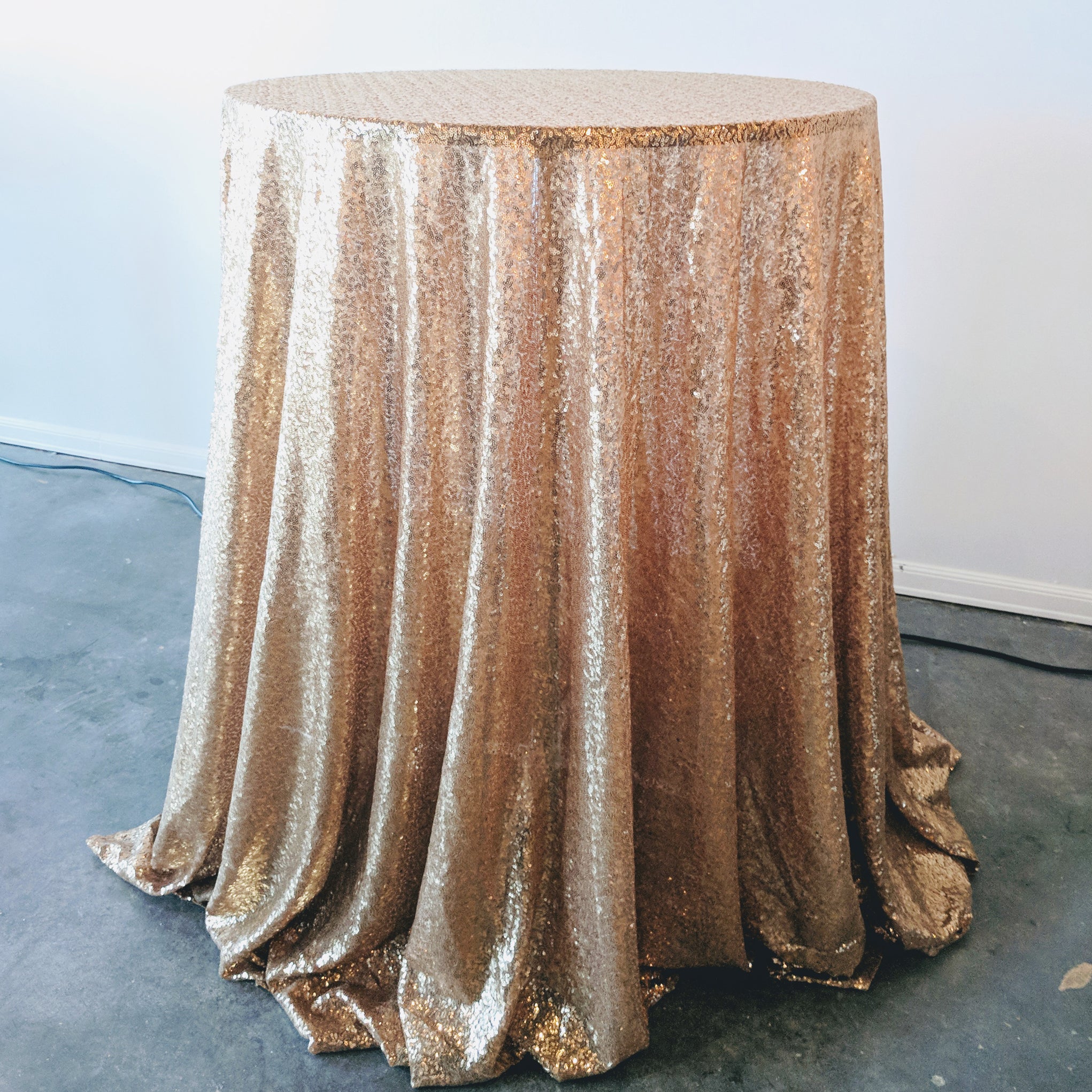 Cocktail Table for wedding party event rental in panama city beach florida with sequin linen rental - The Wedding Shop